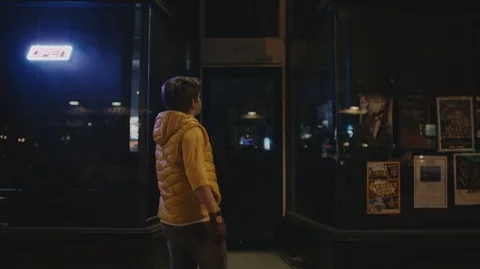 Boy walks into an arcade Stock Footage 118982079