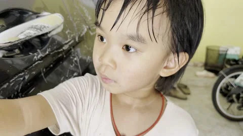 Boy washing car 스톡 동영상 193790722