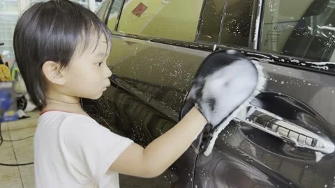 Boy washing car 스톡 동영상 193790744