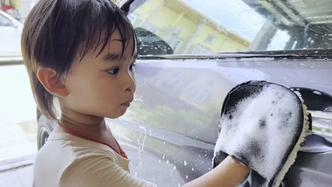 Boy washing car 스톡 동영상 193790750