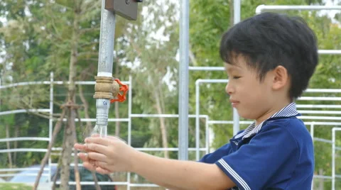 Boy washing his face Stock Footage 57307640