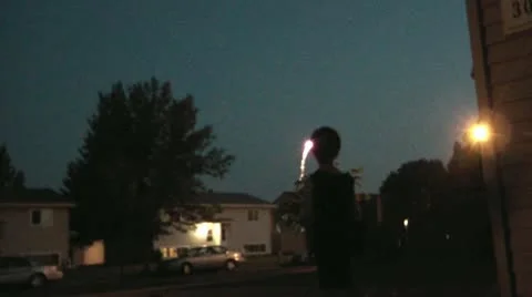 Boy Watching Fireworks Stock Footage 12571995