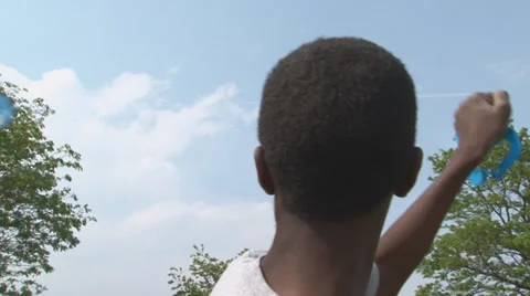 Boy watching his kite. Stock Footage 27893868