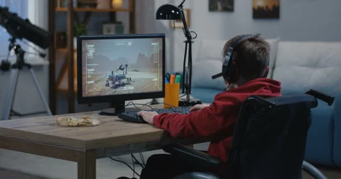 Boy watching movement of a Mars Rover Stock Footage 107434653