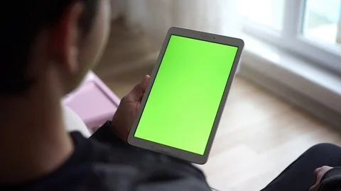 Boy watching tablet vertically Stock Footage 107091396