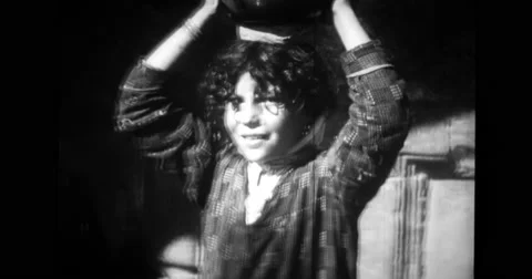 Boy with water jug on head Stock Footage 43442702