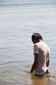 Boy in the water Stock Photos