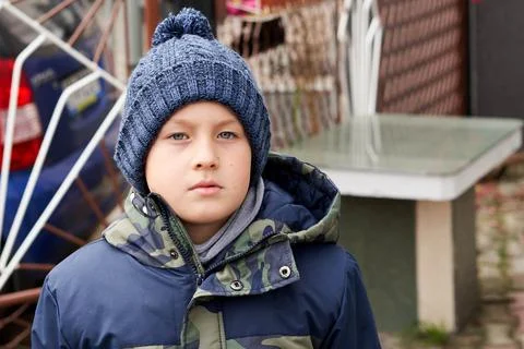 Boy weared in JAcket and hat Stock Photos