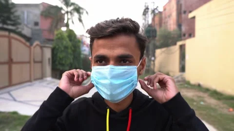 A boy wearing a face mask, 4K Stock Footage 146802949