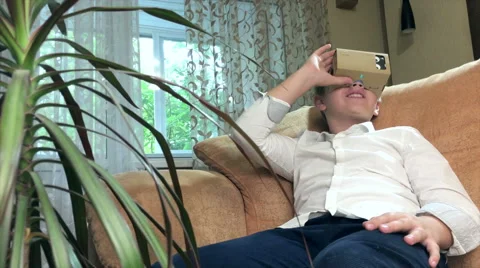 Boy wearing virtual reality goggles 4K. Stock Footage 67532549