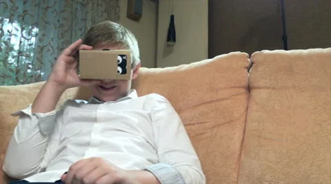 Boy wearing virtual reality goggles 4K. Stock Footage 67534596