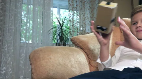 Boy wearing virtual reality goggles 4K. Stock Footage 67535445