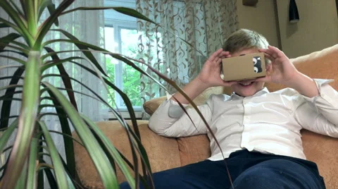 Boy wearing virtual reality goggles 4K. Stock Footage 67563151