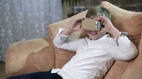 Boy wearing virtual reality goggles HD. Stock Footage 67580758