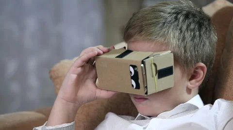 Boy wearing virtual reality goggles HD. Stock Footage 67580775
