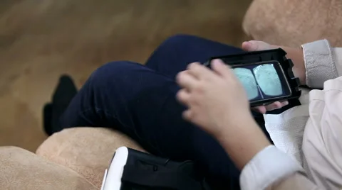 Boy wearing virtual reality goggles HD. Stock Footage 67580851