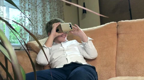 Boy wearing virtual reality goggles 4K. Stock Footage 67581174