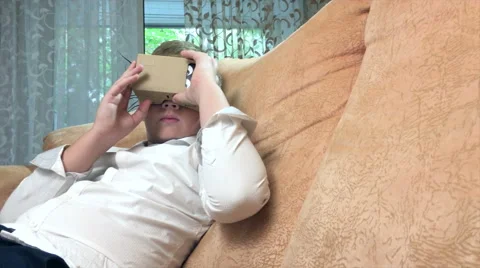 Boy wearing virtual reality goggles 4K. Stock Footage 67581309