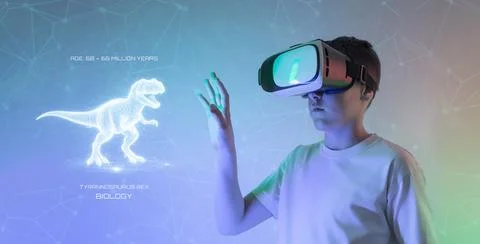 Boy wearing virtual reality headset interacting with holographic dinosaur r.. Stock Photos