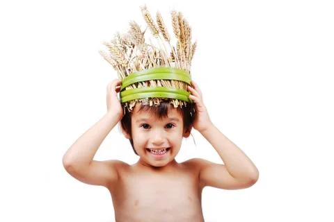 Boy with wheat hat on head Stock Photos