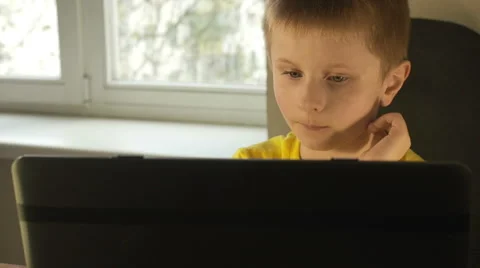 Boy while working on computer close up Stock Footage 62466789