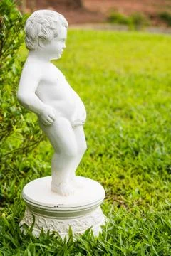 Boy white ceramic statue Stock Photos