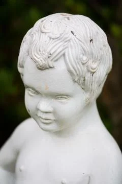 Boy white ceramic statue Stock Photos