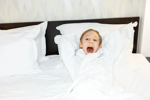 Boy in a white coat Stock Photos