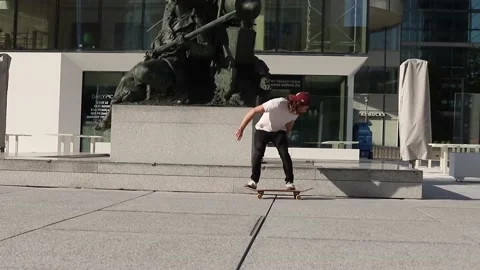 A boy who skates after the lockdown in Paris and does not succeed Stock Footage 130828367