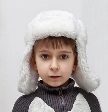 Boy in winter hat Stock Photos