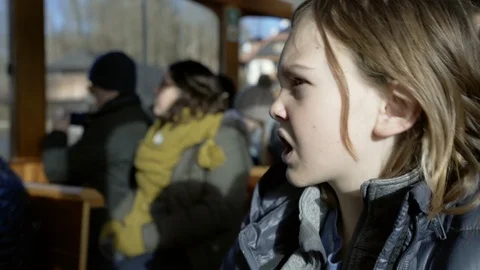 Boy in winter sunlight on boat in Germany Stock Footage 121753239