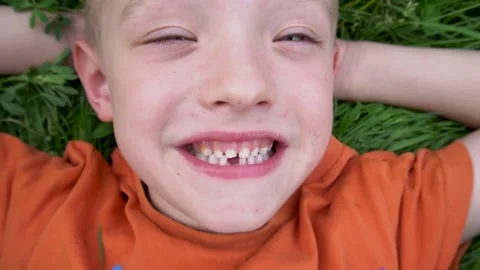 Boy without milk tooth Stock Footage 154374082