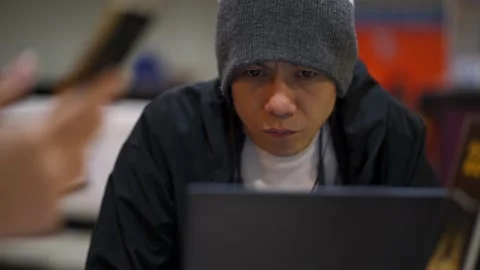 Boy working with Asus Laptop Notebook Computer by Sony A7III Flat Color Stock-Footage 136506166