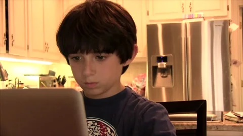 BOY WORKING ON LAPTOP.mp4 Stock Footage 45494138