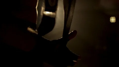 The boy wraps rope to hands with elastic fighting Stock Footage 98834281