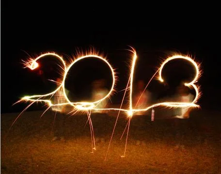 The boy write 2013 new year (fires) 스톡 사진