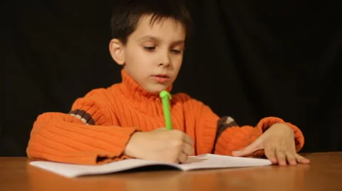 Boy writes the handle Video stock 905841