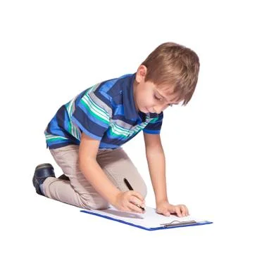 Boy writes in his diary. isolated over white background. Stock Photos