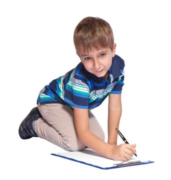 Boy writes in his diary. isolated over white background. Stock Photos