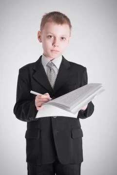 Boy  writes Stock Photos