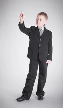 Boy writes Stock Photos