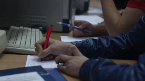 Boy is writing and culculating something Stock Footage 57220010
