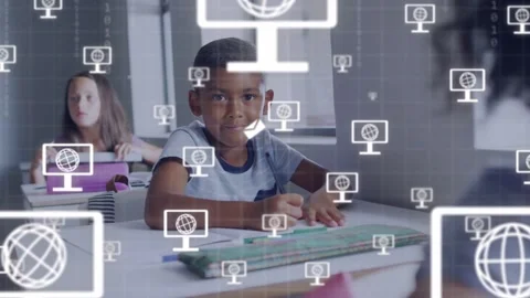 Boy writing and glancing in classroom, starting computer and envelope icons Stock Footage 334351970