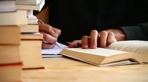 Boy writing and studiyng Stock Footage 10895368