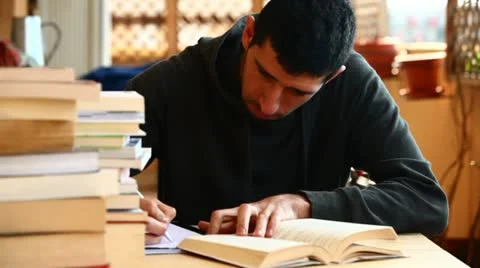 Boy writing and studiyng Stock Footage 10895417