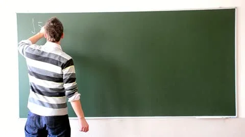 Boy writing on the blackboard Video stock 10826873