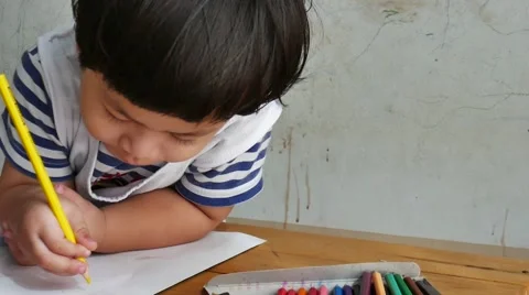 Boy is writing a book on the numbers. 스톡 동영상 58003497