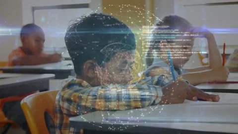 Boy writing in classroom while globe overlay fading in and rotating with code Stock Footage 320089004