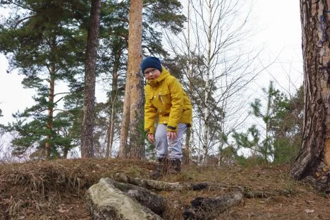 Boy in a yellow jacket Stock Photos