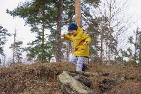 Boy in a yellow jacket Stock Photos
